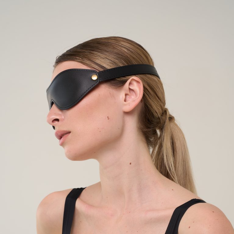 Handmade black leather blindfold side view