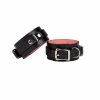 handmade black leather lockable handcuffs with pink lining and silver hardware 2